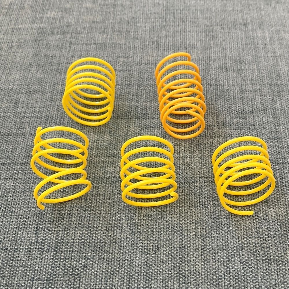 5 Gently Used Yellow Cat Spring Toys